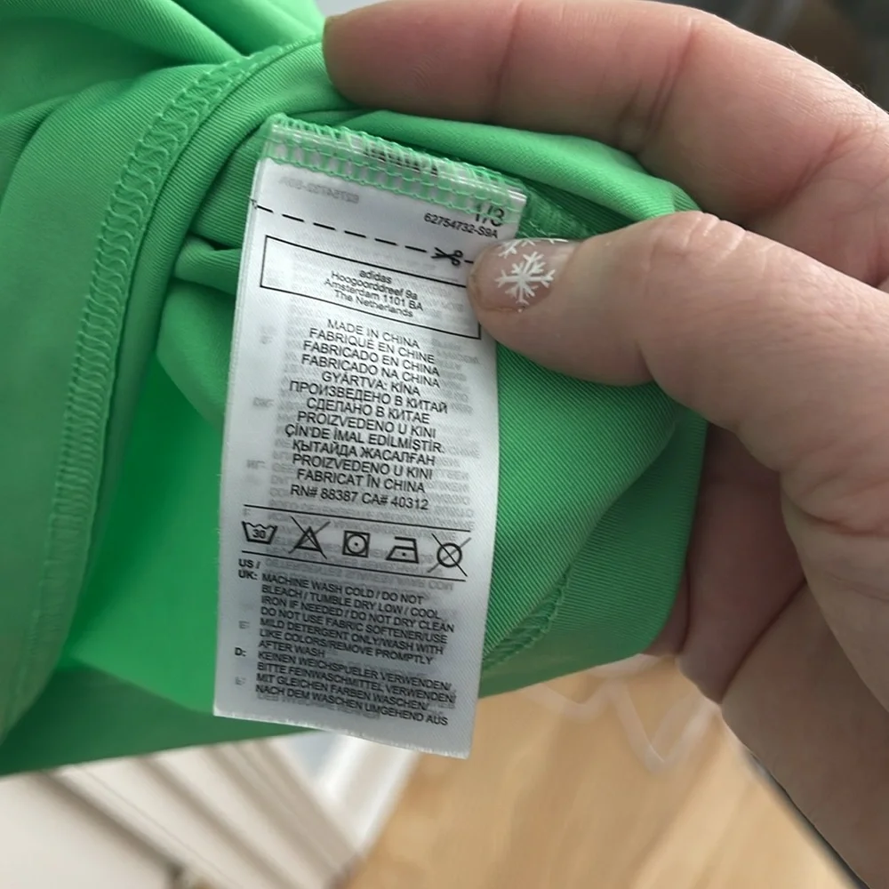 Adidas men’s polo in prime-green size medium.